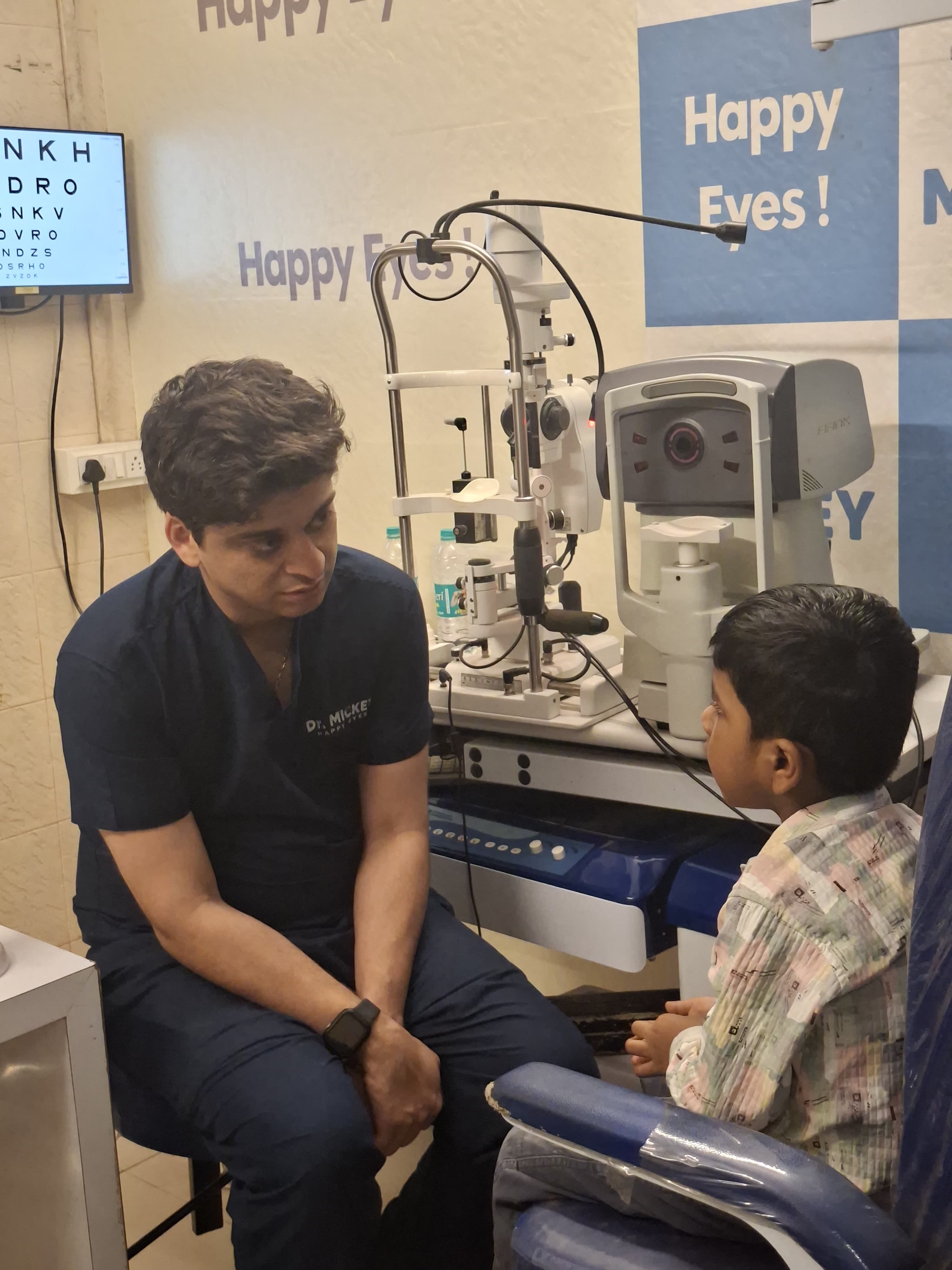 Dr Mickey consulting with a young patient